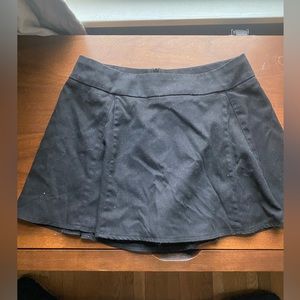 Black skort. Fits more low rise.